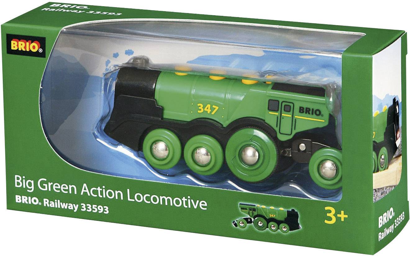 Zeleni model igračke lokomotive u prozirnoj ambalaži s natpisom 'Big Green Action Locomotive'. Prikladno za djecu od 3 godine.