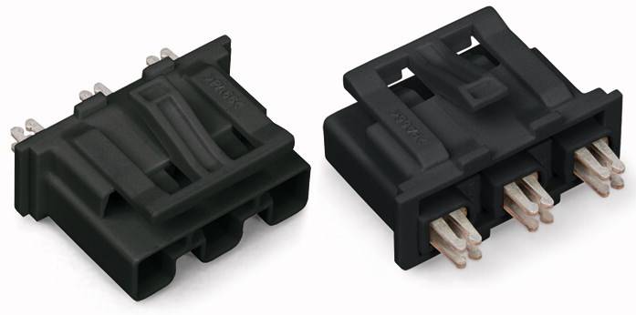 Dva crna plastična konektorska spoja sa četiri metalne čivije, položena jedan do drugog, prikazuju svoj gornji dio.