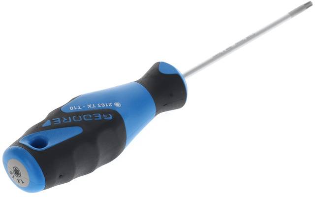 Egy kék és fekete csavarhúzó ergonomikus markolattal és torx hegyű, fehér felületen fektetve.