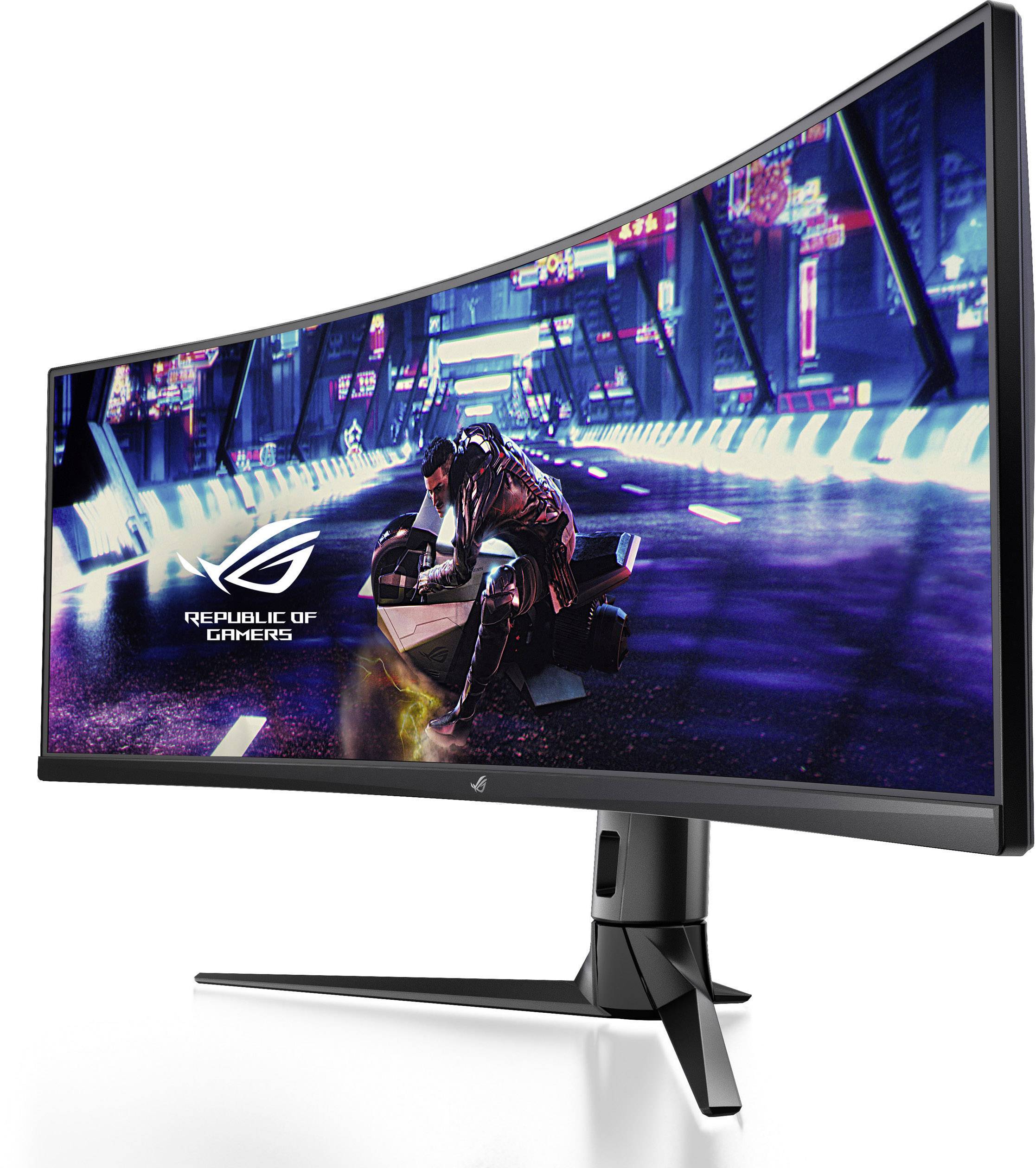 Egy ívelt ASUS Republic of Gamers gamer monitor egy videojáték futurisztikus városi képét mutatja, amelyen egy motorkerékpáros látható.