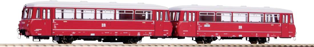 Két piros sínbusz, egymás mellett egy sínpályán állva, fehér tetőkkel és ablakokkal mindkét oldalukon.