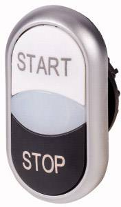 Ezüstös kapcsoló 'INDÍTÁS' felirattal felül és 'LEÁLLÍTÁS' felirattal alul.