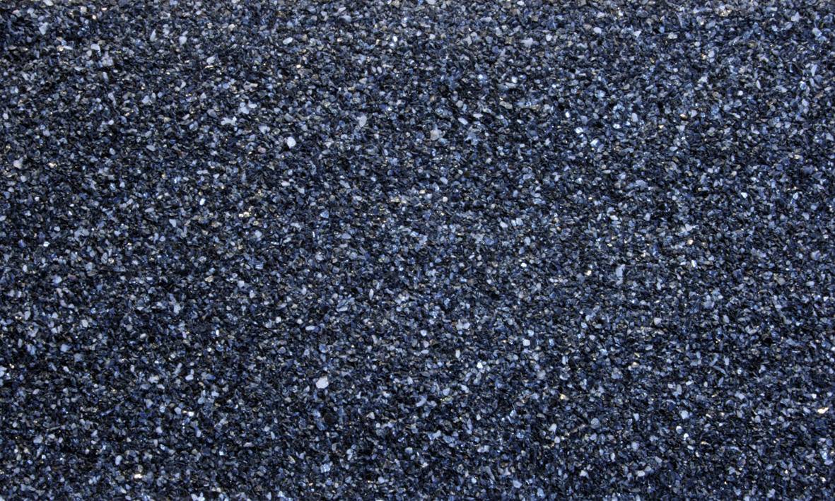 Sötét aszfaltfelület finom, szemcsés textúrával.