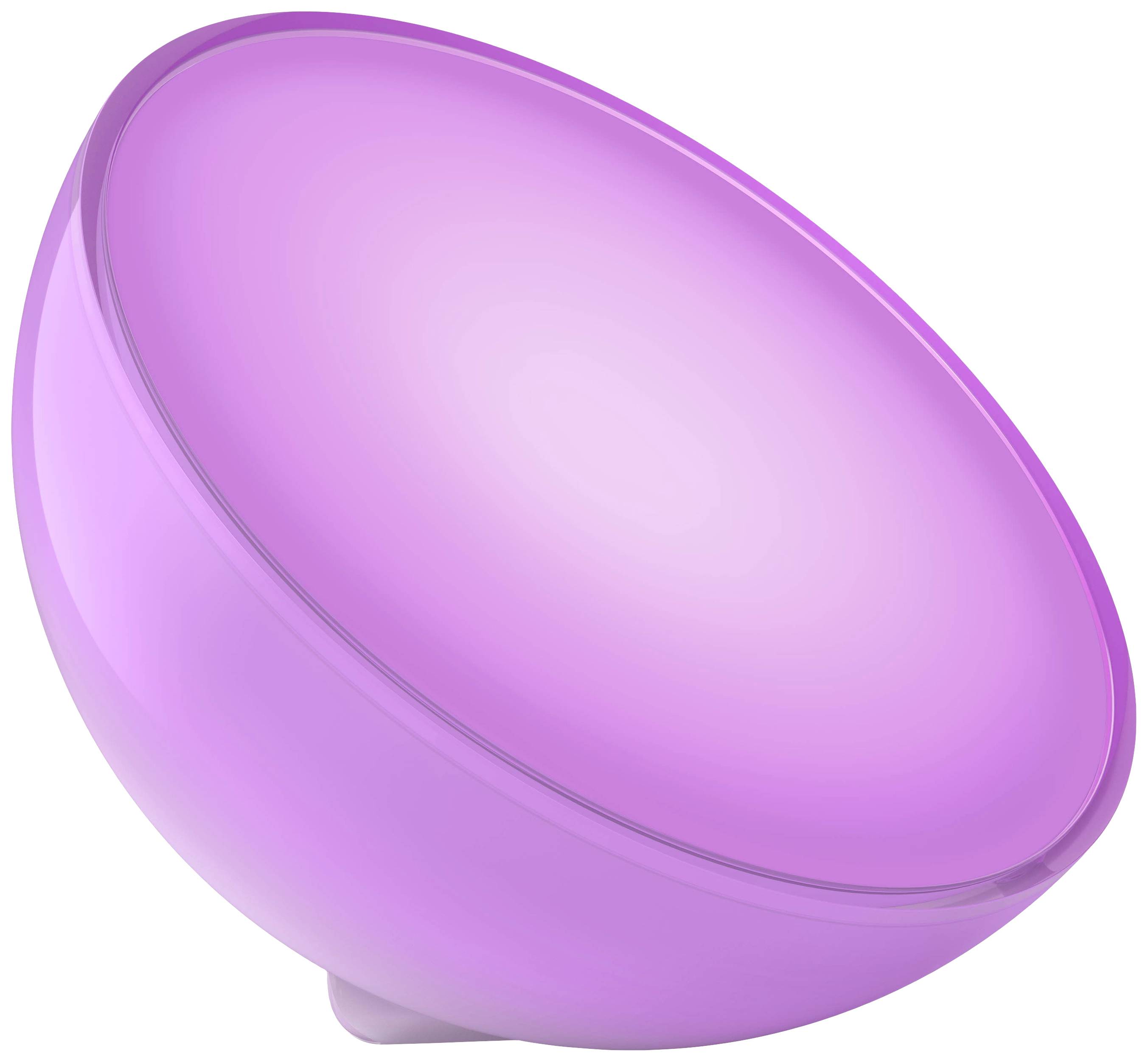 Egy lila fénygolyó áll az asztalon, gyengén világít egy sötét szobában, és hangulatos atmoszférát teremt.