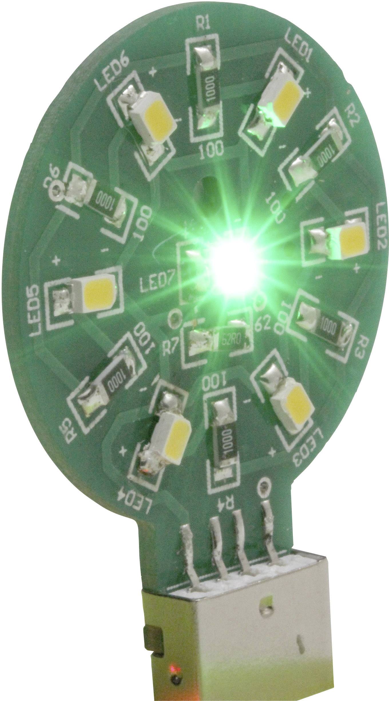 Egy kerek nyomtatott áramkör több LED-del, amelyek közül az egyik zölden világít. Alul USB-csatlakozóval összekötve.