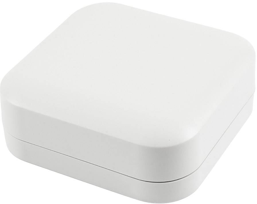 Egy egyszerű, négyzet alakú, fehér doboz lekerekített sarkokkal.