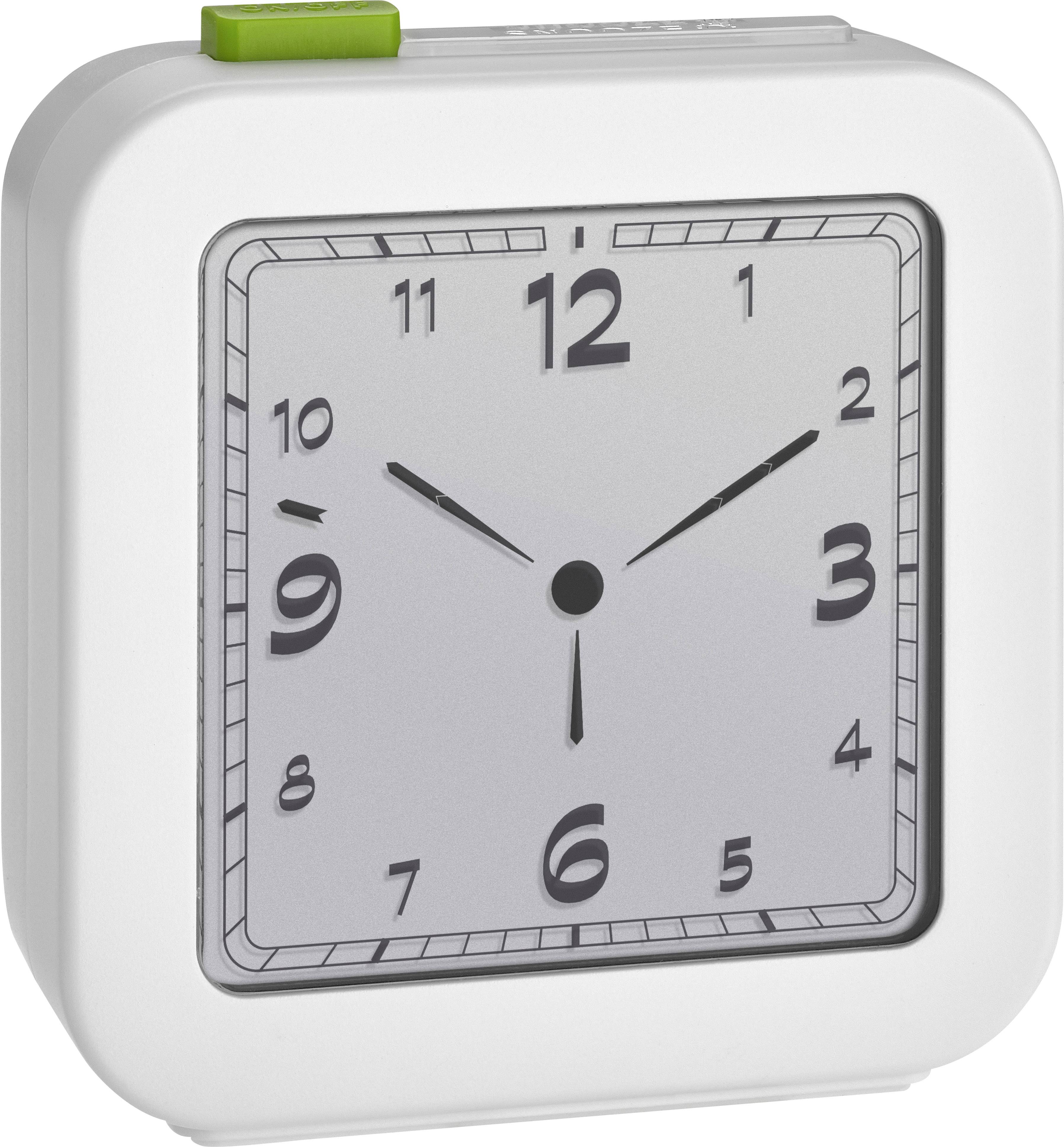 Egy fehér, négyzet alakú ébresztőóra zöld kapcsolóval 12:01-et mutat.