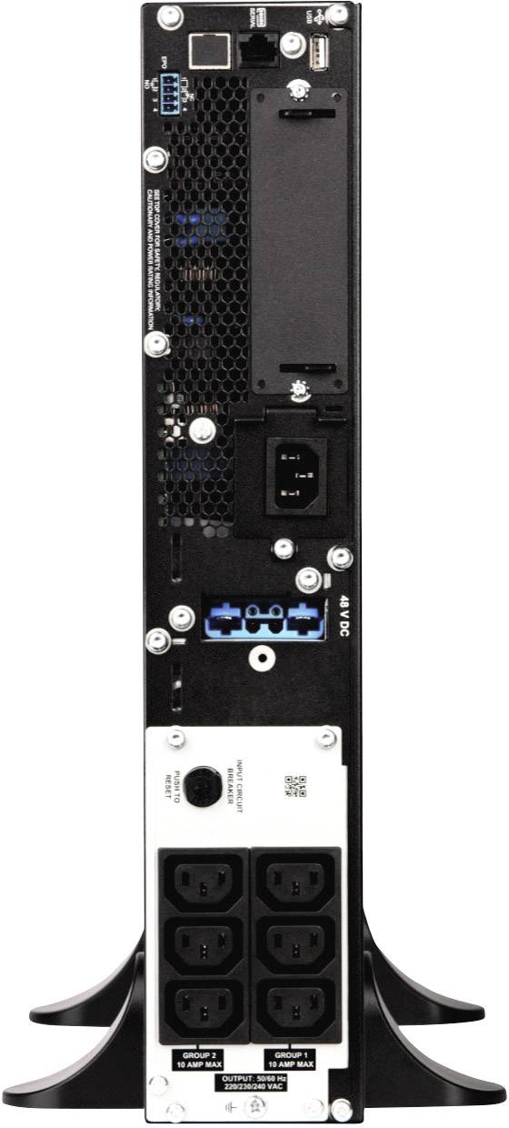 Egy elektronikus eszköz hátulnézete, fekete házán lévő csatlakozókkal, USB- és hálózati portokkal.
