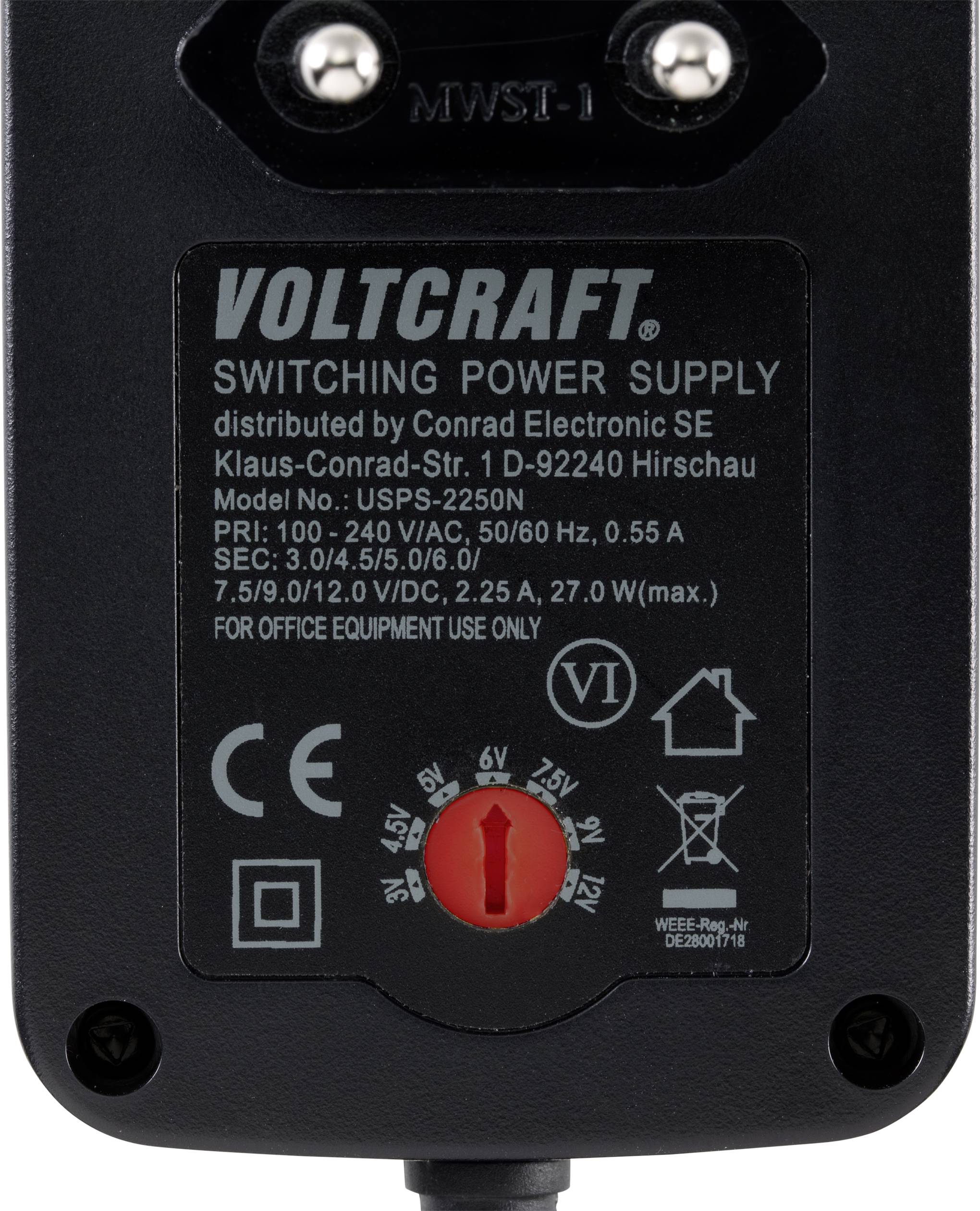 Egy Voltcraft márkájú fekete hálózati tápegység, USPS-2250N típusszámmal. Több kimeneti feszültséggel rendelkezik, és irodai használatra alkalmas.