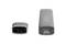 Egy USB-C-adapter egy külön csatlakozókábel mellett. Az adapter hengeres alakú, míg a kábel vége téglalap alakú.