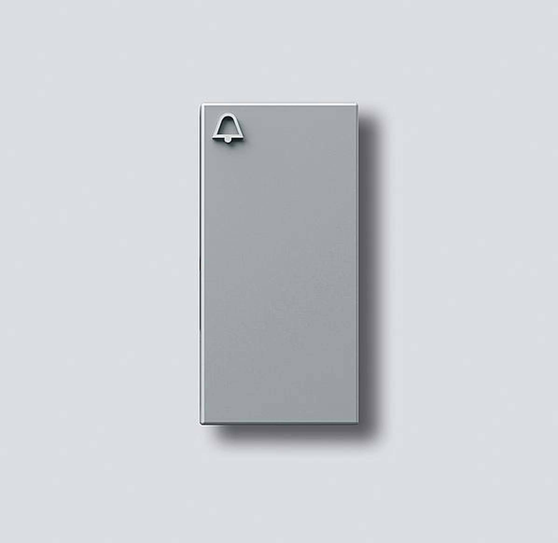 Szürke téglalap alakú felület egy kis harang szimbólummal a bal felső sarokban.