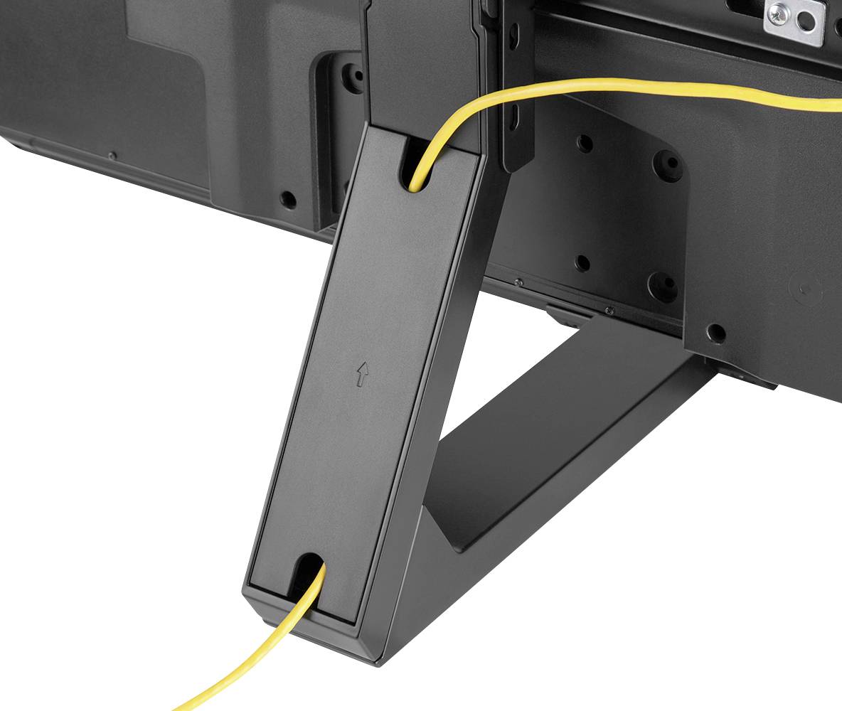 Egy monitor hátsó oldala beépített kábelvezető rendszerrel. Egy sárga kábel halad át a kábelvezető csatornán.
