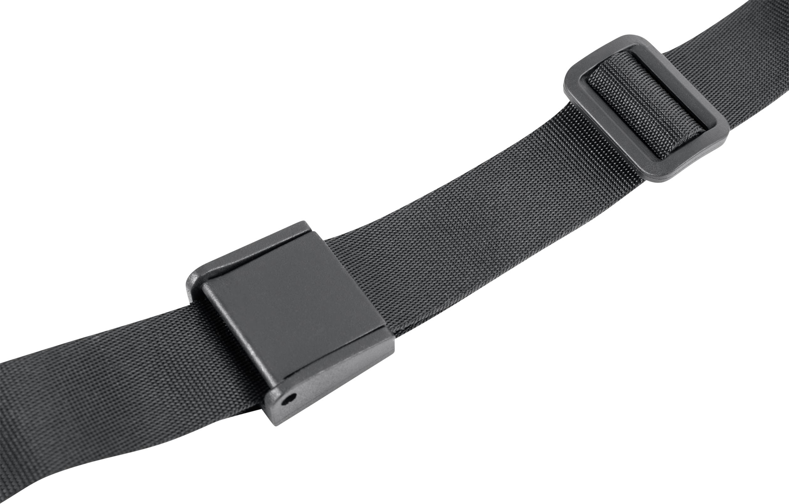 'Egy fekete, állítható öv közelképe, csattal.'