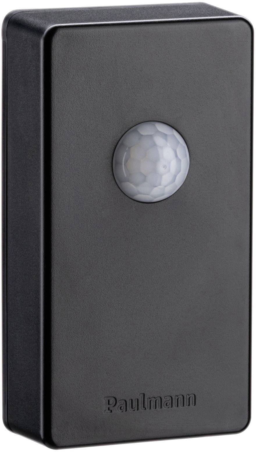 Egy téglalap alakú, fekete mozgásérzékelő, kerek szenzorral a közepén, 'Paulmann' márkajelzéssel, világításvezérlési célra.