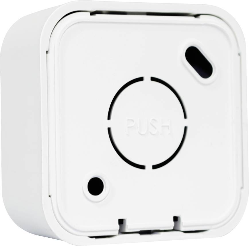 Egy fehér, enyhén lekerekített sarkú négyzet alakú műanyag ház, amelynek közepén egy 'NYOMÓ' terület található.