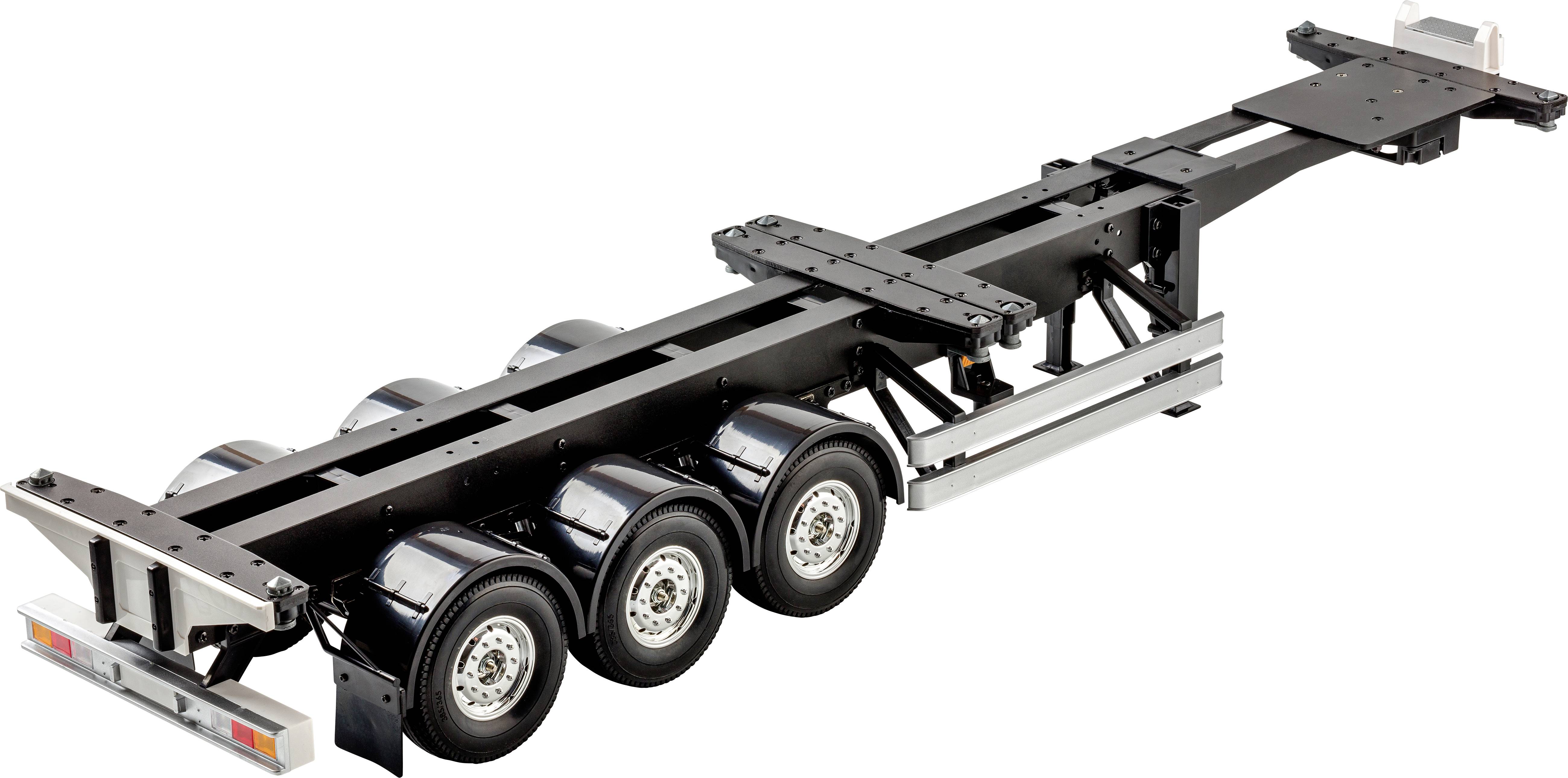 Egy három tengelyes pótkocsi, amely konténerek szállítására alkalmas. A kivitel robusztus és stabil.