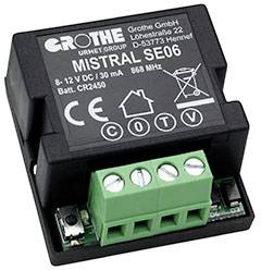 Egy elektronikus eszköz 'Mistral SE06' felirattal, feszültség 8-12 V DC, áramerősség 30 mA. Tartalmaz egy zöld csatlakozót.