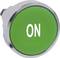 Nagy, kerek, zöld gomb 'ON' felirattal, jelzi az aktiválási állapotot.