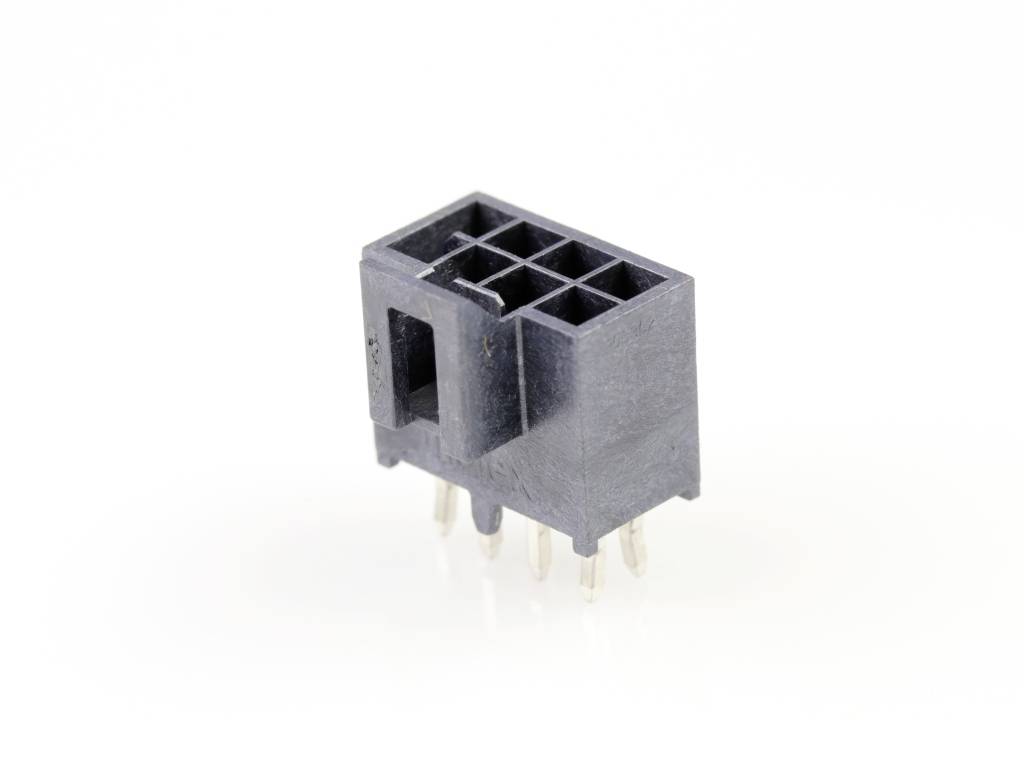 Egy fekete, téglalap alakú elektromos csatlakozó több fémcsappal, amely alkalmas egy nyomtatott áramkör csatlakoztatásához.