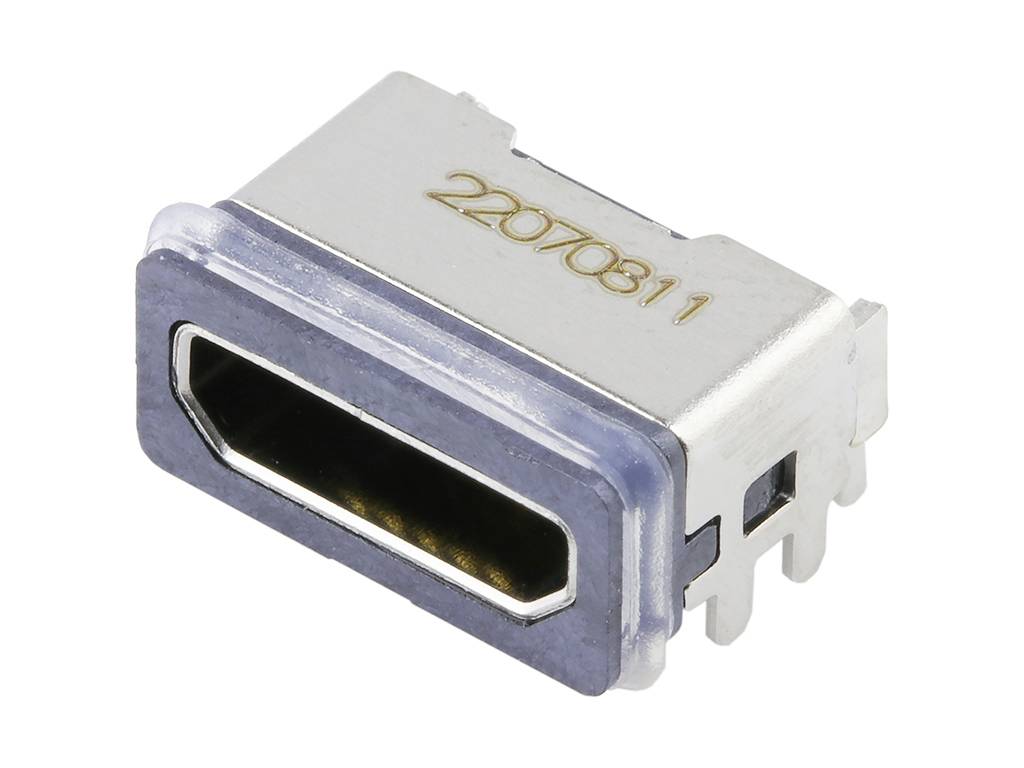 'Ezüstszínű HDMI-csatlakozó elektronikus eszközökhöz, fémházas kivitel, téglalap alakú arany érintkezőkkel.'