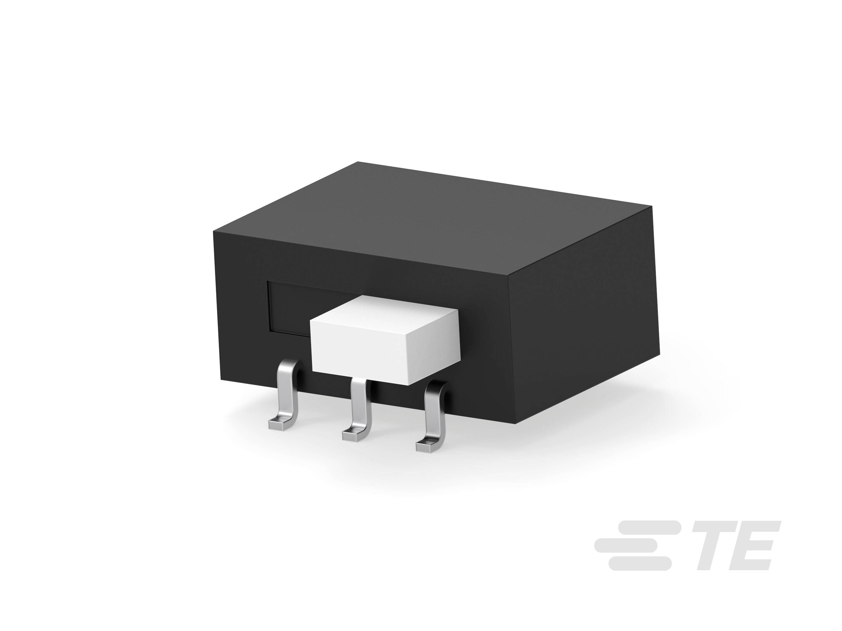 Fekete elektronikai alkatrész három fémes lábbal és egy fehér téglalappal a közepén, fehér háttér előtt.