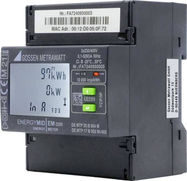 Egy Gossen Metrawatt digitális fogyasztásmérő 97,7 kWh fogyasztást mutat. Szürke házburkolata van és több műszaki információval rendelkezik.