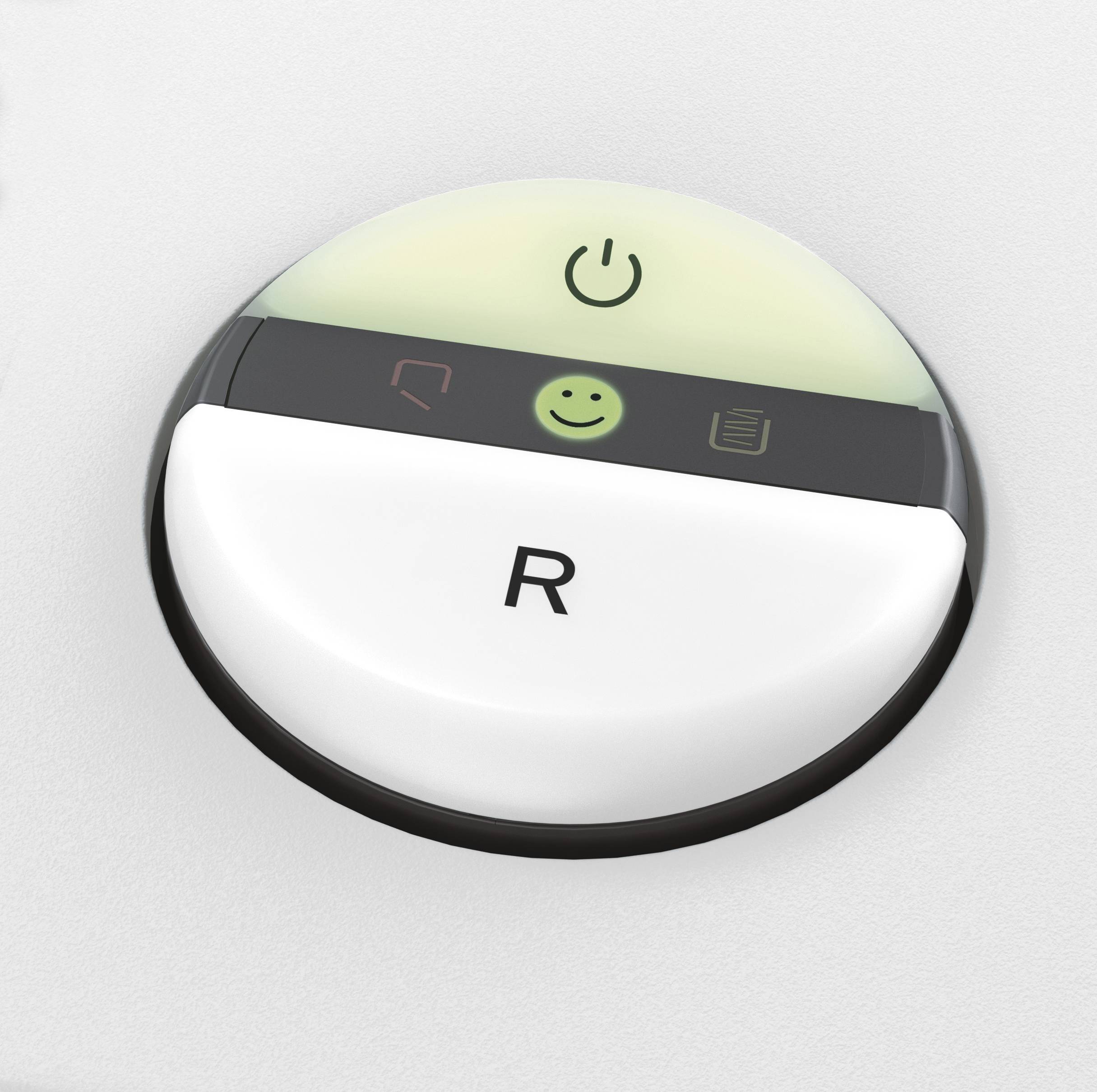 Egy kerek gomb, amelynek előterében egy mosolygó arc, egy Be/Ki kapcsoló szimbólum és egy 'R' betű látható. Eszközállapot jelzője.