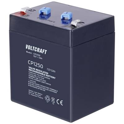 'Voltcraft CP1250' akkumulátor, 12V, 5Ah, fekete, piros és kék csatlakozókkal felül. A csatlakozók mellett szöveg: 'Ne zárja rövidre'.