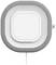 Szürke, lekerekített sarkú négyzet alakú eszköz, fehér központi résszel, felfüggesztve egy falon.