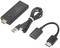 Egy fekete HDMI-streaming stick USB-kábellel, USB-dugóval és HDMI-adapterrel, amellyel televízióhoz csatlakoztatható.