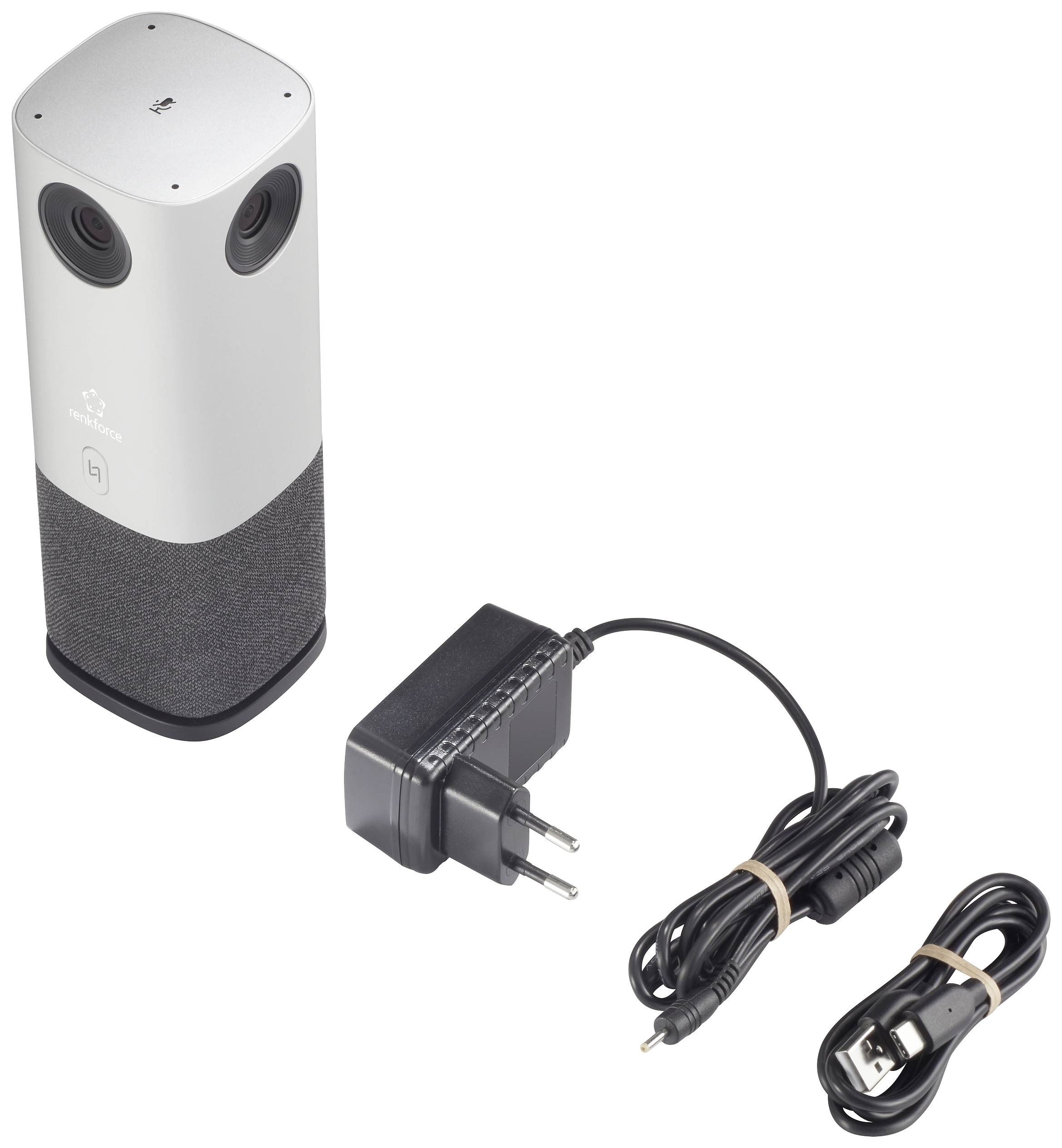 Egy szürke, hengeres hangszóró két lencsével egy fekete tápegység és USB-kábel mellett.