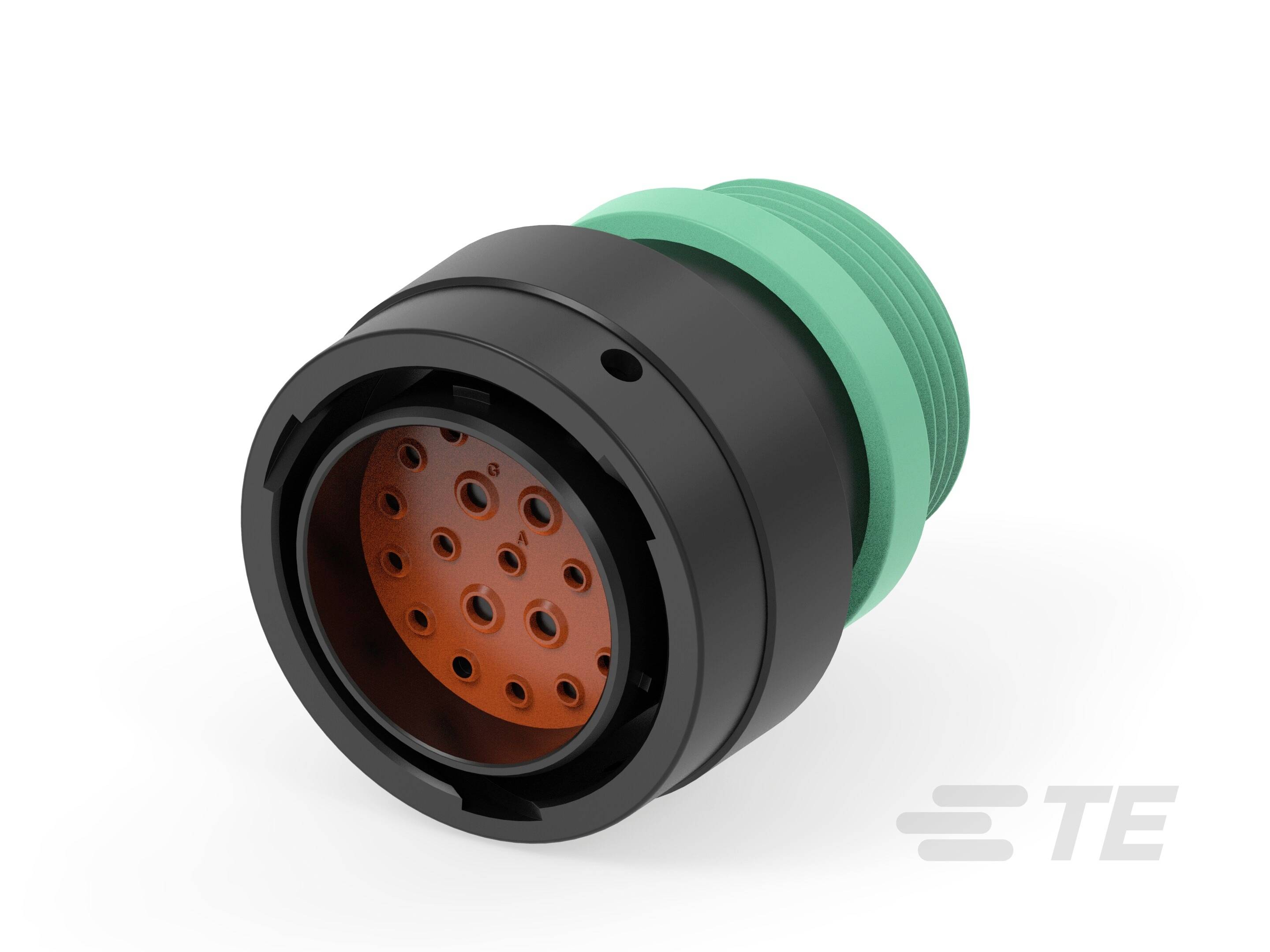 'Fekete és zöld több érintkezős csatlakozó, márkalogó jobbra lent látható.'