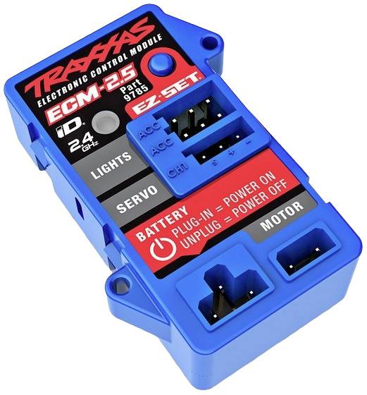 Kék elektronikus vezérlőmodul, elemről működtethető, feliratokkal: 'Lámpák', 'Szervó', 'Kieg.' és 'Motor', csatlakozási lehetőségeket mutat.