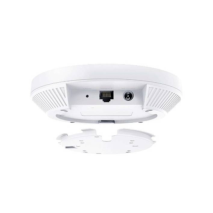 Egy kerek, fehér WiFi hozzáférési pont, amelynek alsó nézete látható, Ethernet- és tápcsatlakozóval. Mennyezeti felszerelésre alkalmas.