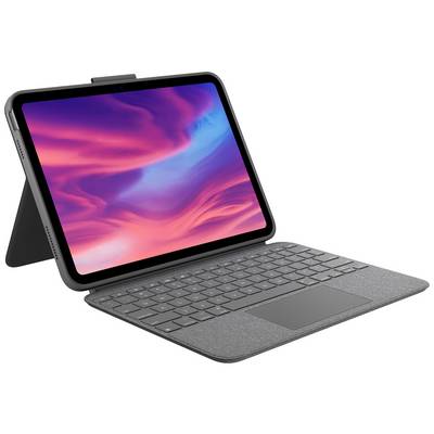 Egy levehető billentyűzettel rendelkező tablet áll egy asztalon. A képernyőn élénk színekben játszó absztrakt minta látható.