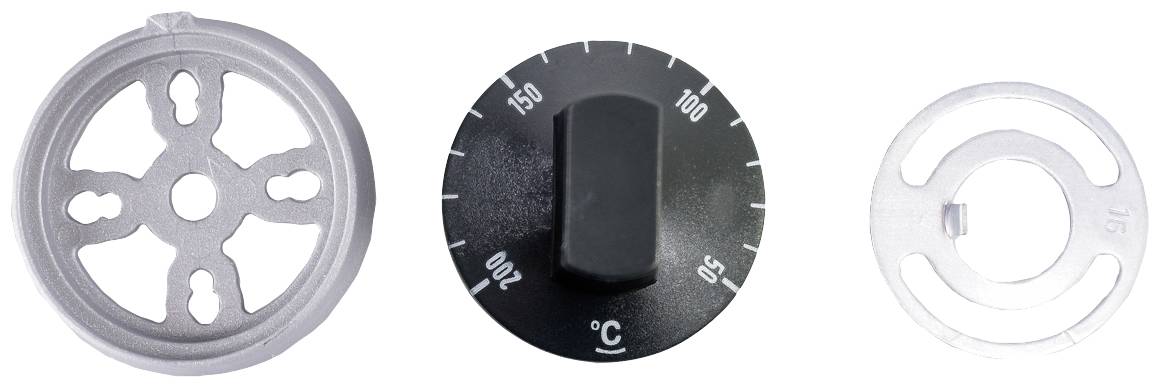 Három különböző forgatógomb: egy ezüst kivágásokkal, egy fekete 50°C-tól 200°C-ig terjedő hőmérséklet-jelöléssel, egy ezüst gyűrű.
