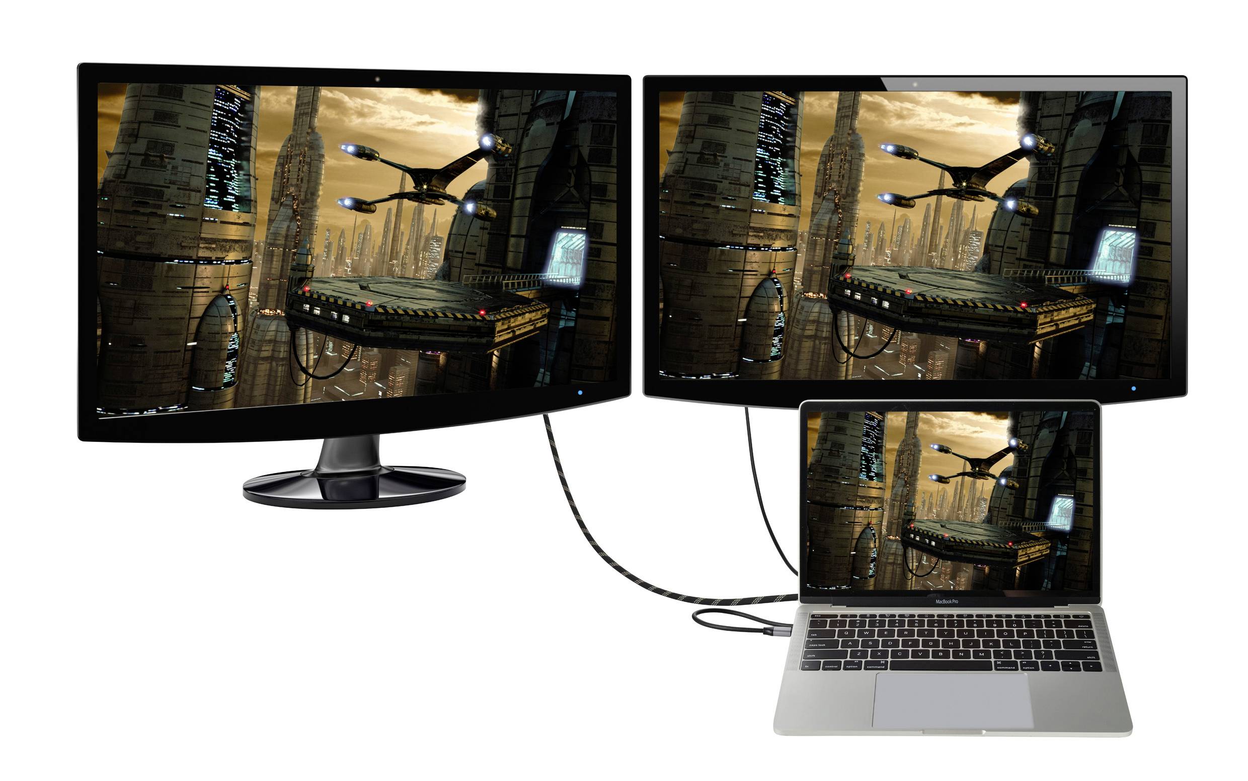 Laptop csatlakoztatva két monitorhoz, amelyek egy futurisztikus várost ábrázolnak. Urbánus látvány magas épületekkel és lebegő platformokkal.