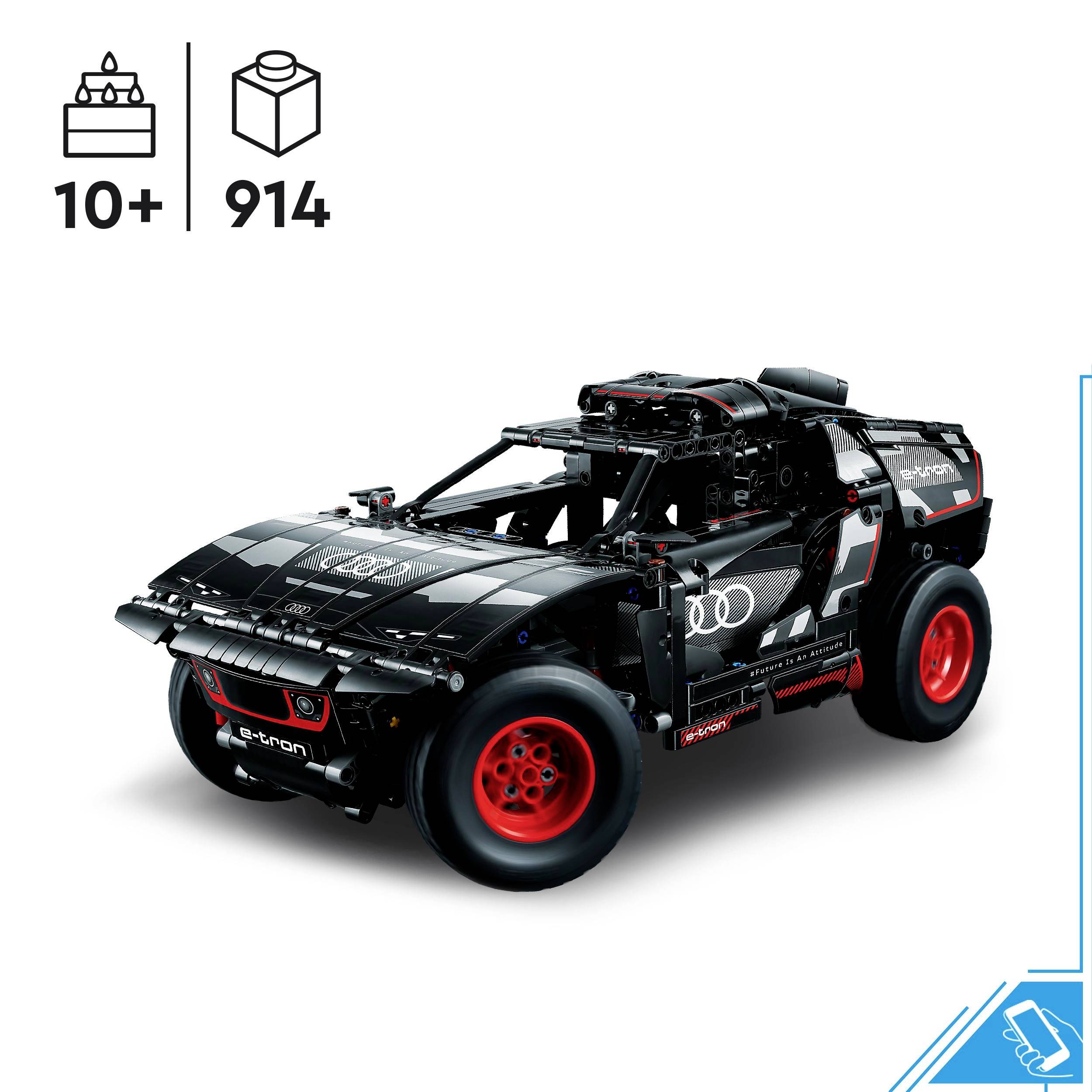 Egy Lego Technic modell egy fekete és piros járműről Audi részletekkel, 10 éves kortól, 914 darabos készlet.