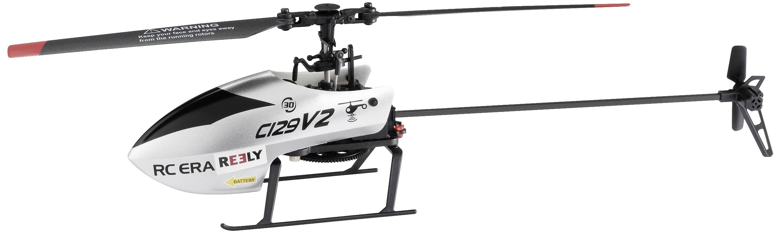 Egy fehér házburkolatú, 'C129 V2' feliratú távirányítású helikopter, vékony futóművön állva.