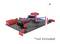 Egy fogaskerékszerkezetű konstruktőr játék fekete lemezen. Egy nyíl mutat egy fehér csapszegre, amely nem tartozék.