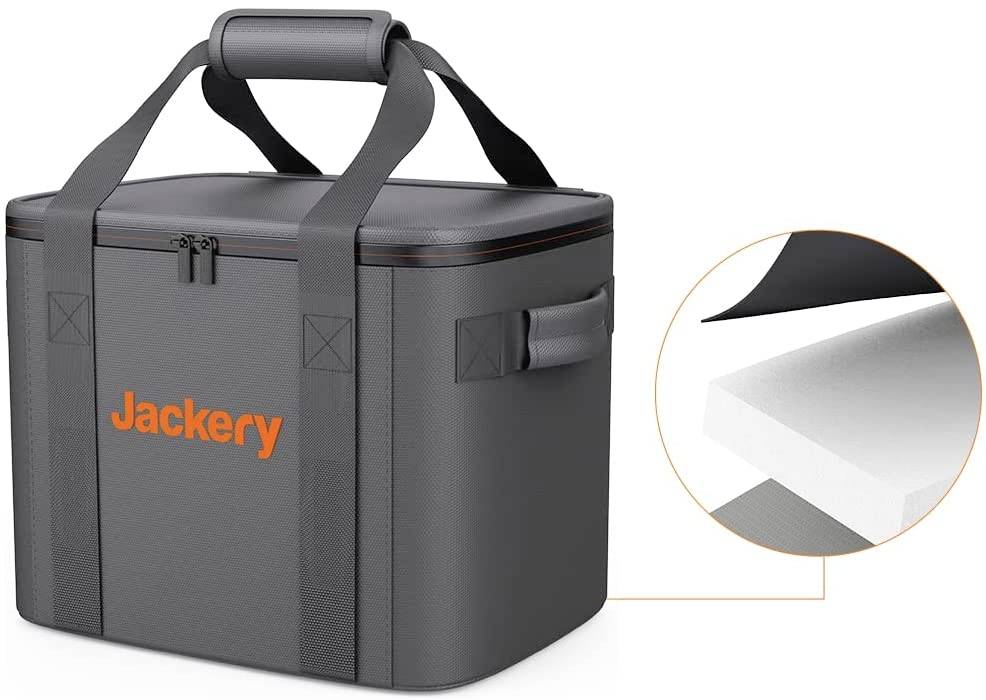 Szürke hűtőtáska narancssárga 'Jackery' felirattal. Részletfelvétel mutatja a vastag szigetelőréteget. Szabadtéri tevékenységekhez alkalmas.