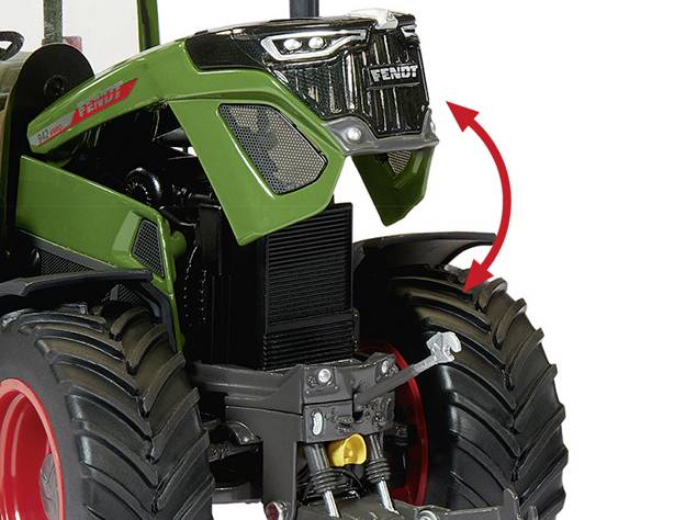 Nyitott motorburkolattal rendelkező traktormodell, amelynek egy piros csapágy van megjelölve. Bemutatja az elülső rész és a gumiabroncs mintázatának részleteit.