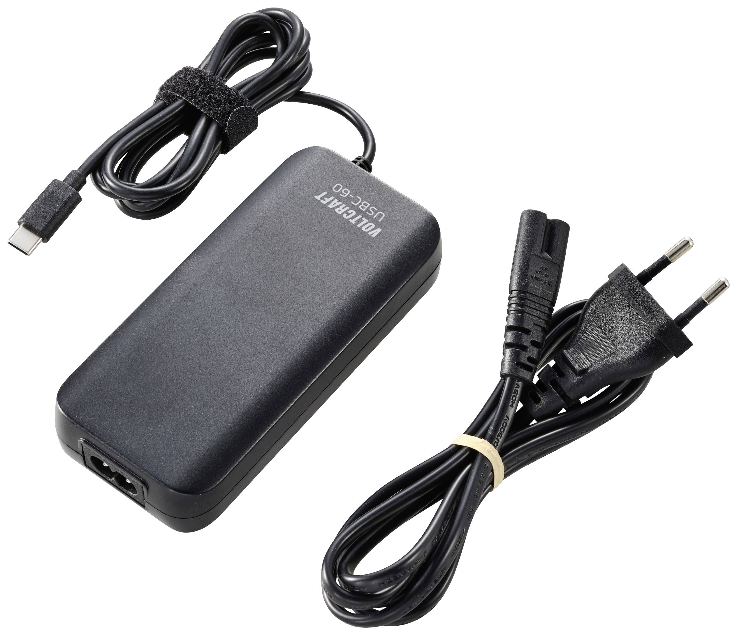 USB-C-kábellel és EU-dugvillával rendelkező tápegység, külön választva. Fekete dizájn, alkalmas laptopokhoz és egyéb eszközökhöz.