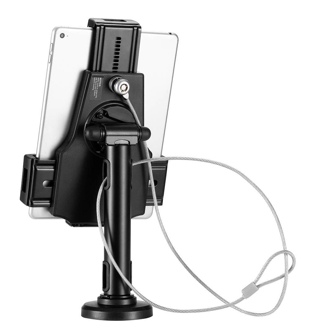 Egy tablet egy robusztus fekete tartóban, biztonsági zárral és acélkábellel, lopásgátló eszközként.