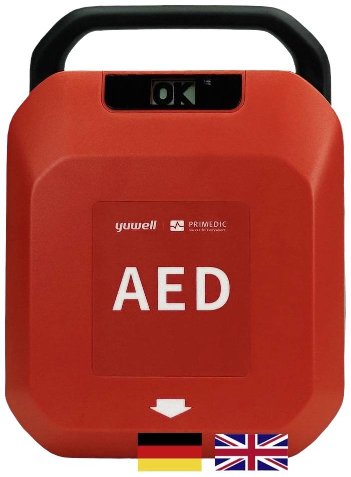 Egy piros AED-készülék, amelyen 'AED' és 'OK' felirat látható felül. Alatta Németország és Nagy-Britannia zászlaja helyezkedik el.