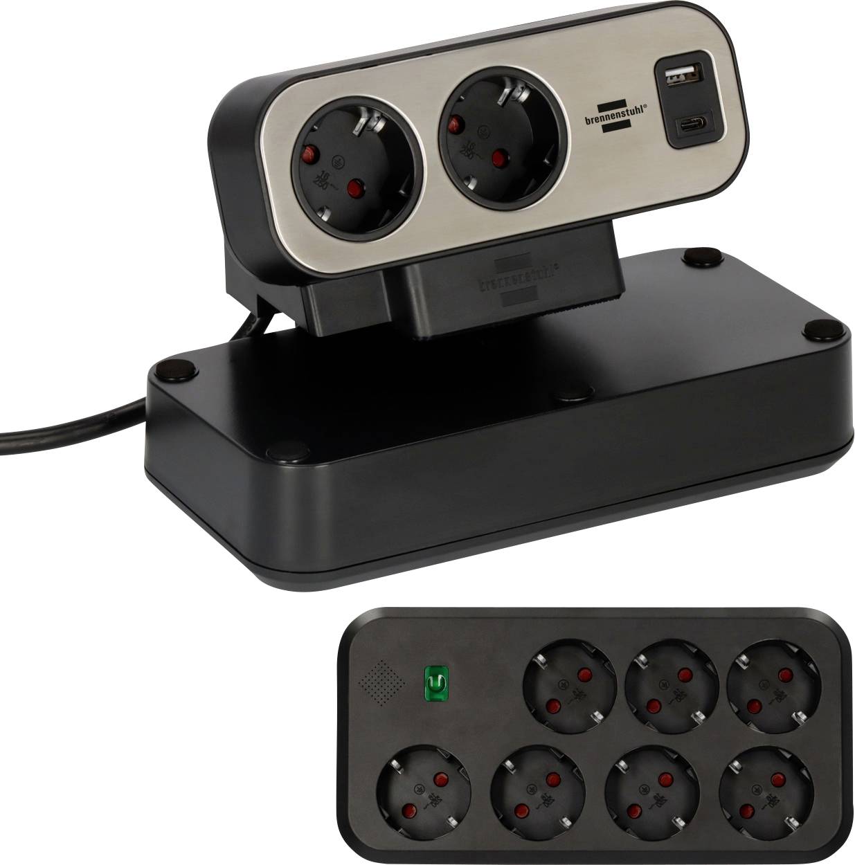 Egy fekete és ezüst szín csíkos elosztó két nézete hat földelt aljzattal és két USB porttal, fehér háttéren ferdén bemutatva.