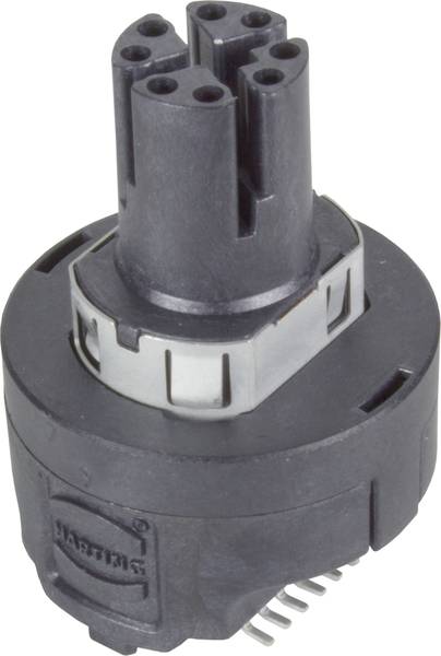 Egy fekete, hengeres elektromos csatlakozó adapter több csatlakozóaljzattal és fém érintkezőkkel az alsó részén.