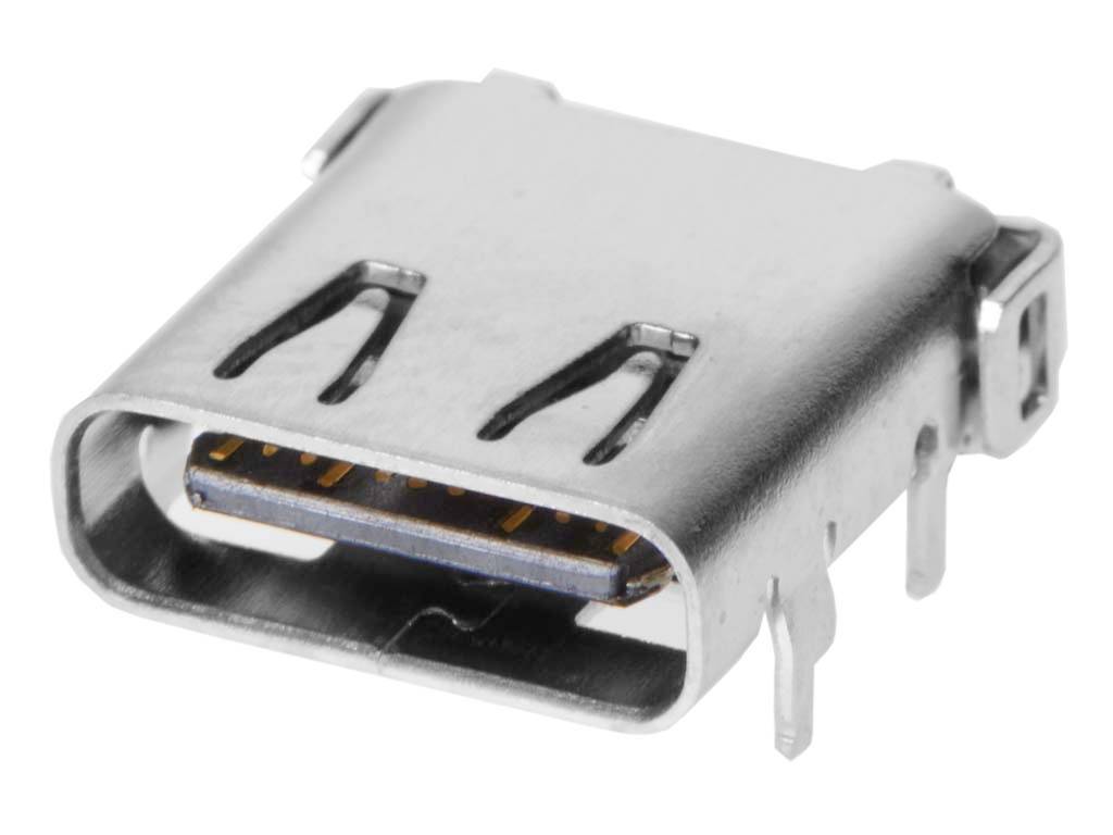 Közeli felvétel egy ezüst USB-C csatlakozóról, amelynek belsejében jól láthatók az érintkezőpontok, alkalmas adatátvitelre és áramellátásra.