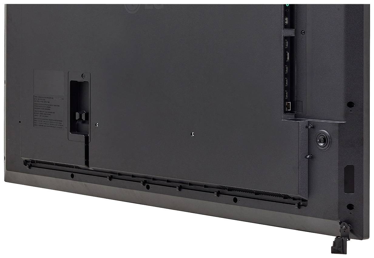 Egy televízió hátlapjának látványa, amelyen láthatóak a csatlakozóportok és a fali rögzítés lehetőségei.