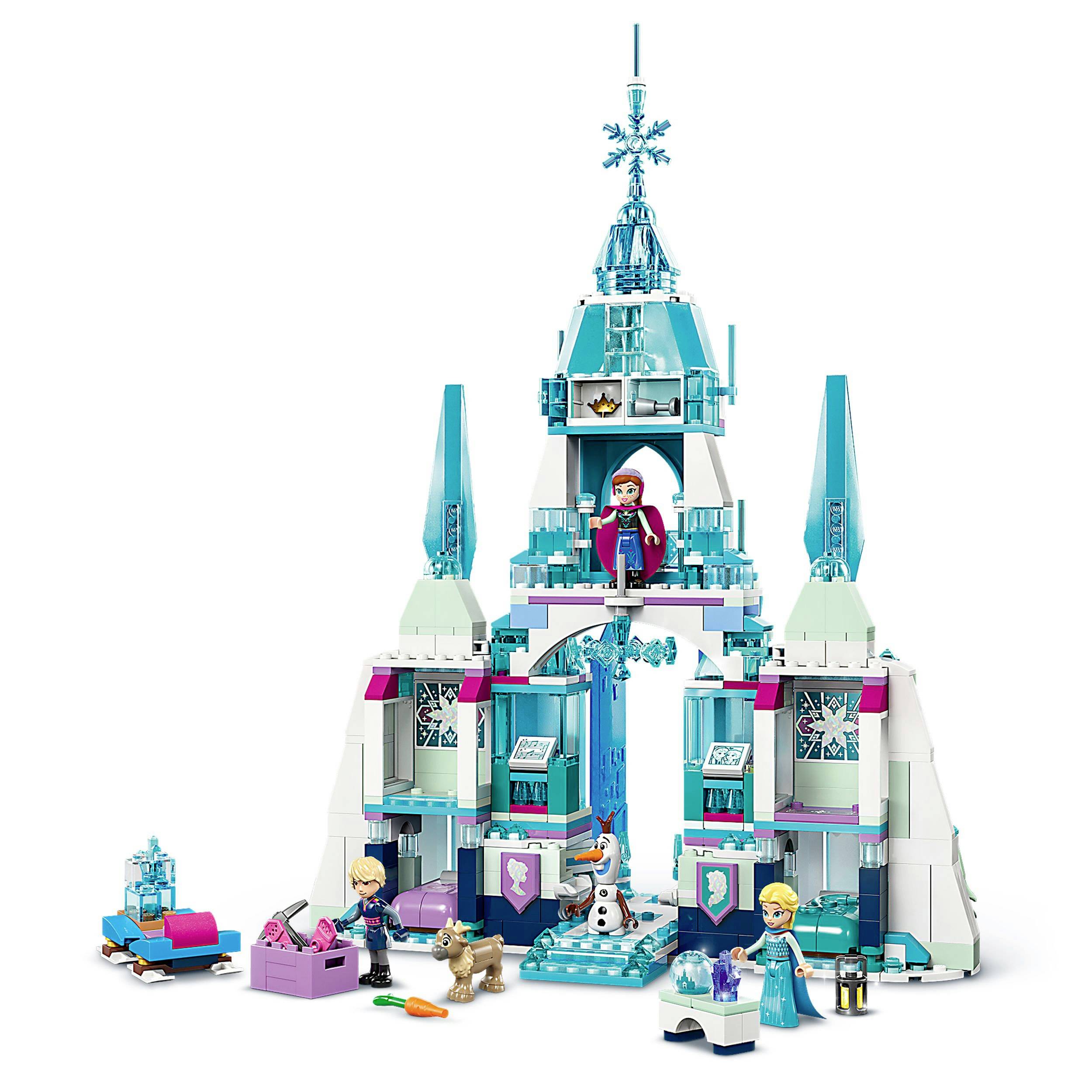 Egy havas vár LEGO-készlete, amelyben játékfigurák találhatók, köztük kék és fekete ruhás figurák és egy hóember.
